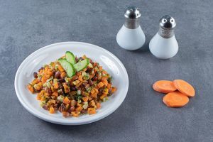 vegetable-salad-plate-sliced-carrots-salt-marble-surface-300×200 Carrot Cucumber and Rajma Salad
